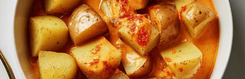 Kartoffelwürfel mit Paprika und Knoblauch
