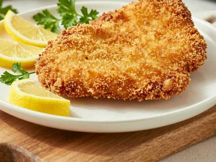 Schnitzel aus der Heißluftfritteuse: Knusprig ohne Fett, in 15 Minuten!